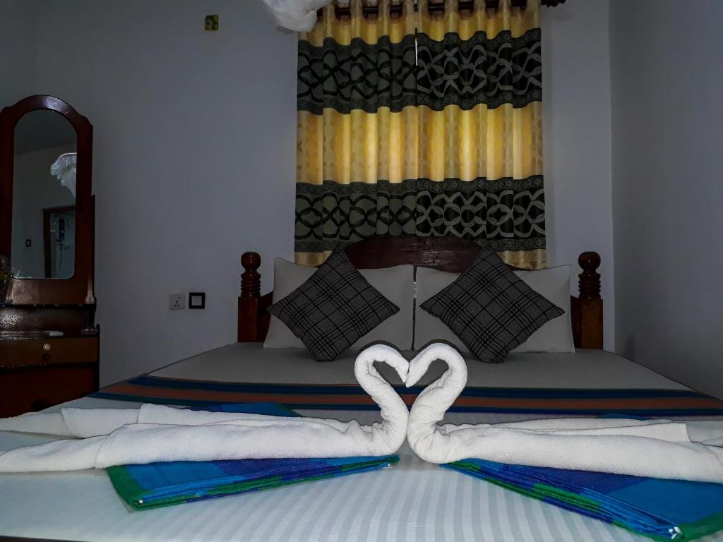 Postel nebo postele na pokoji v ubytování Danara Homestay