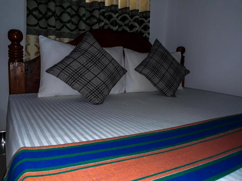 Postel nebo postele na pokoji v ubytování Danara Homestay