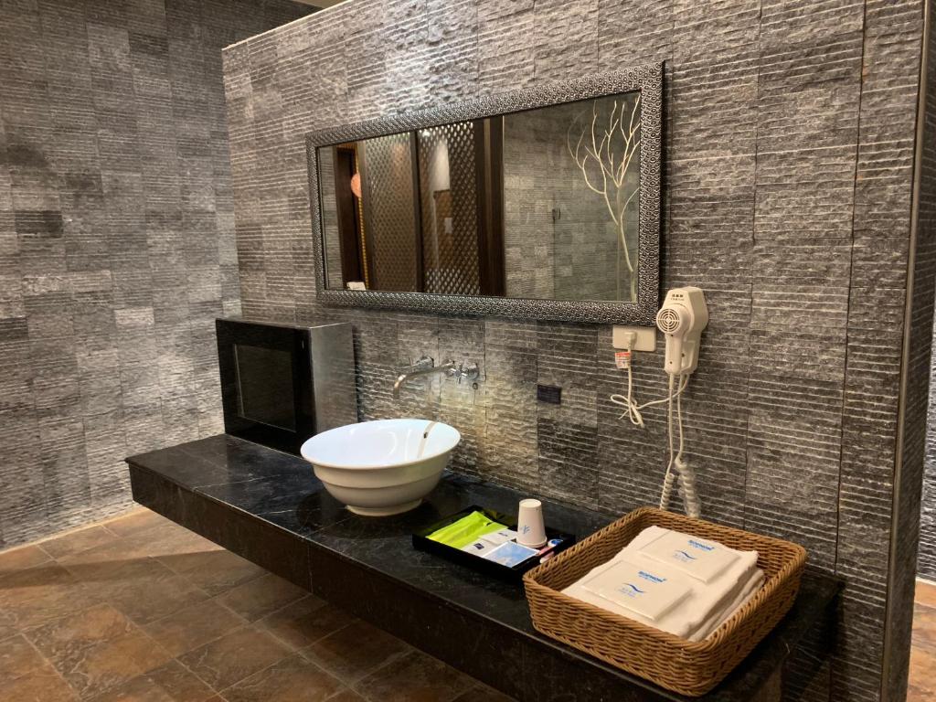 Koupelna v ubytování Her Home Spa Motel Douliu