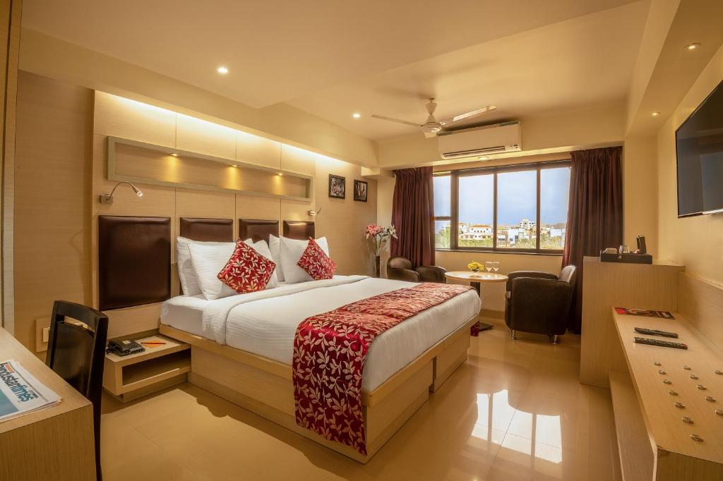 Postel nebo postele na pokoji v ubytování Hotel Oriental Aster - Mumbai International Airport