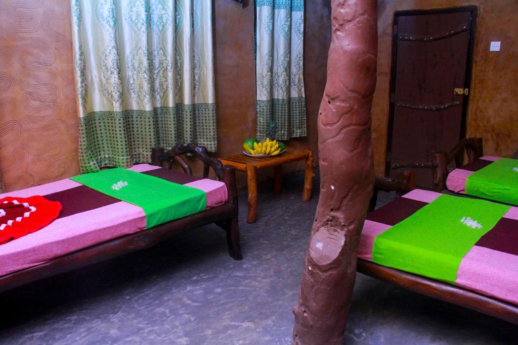 Postel nebo postele na pokoji v ubytování YalaWay Nature Villa