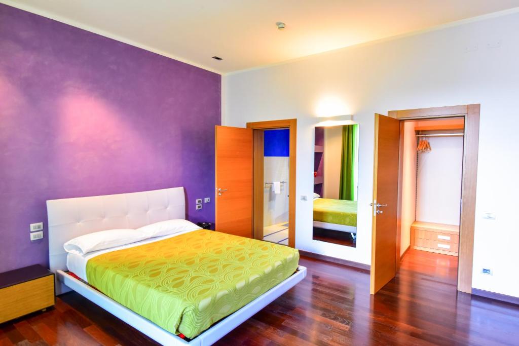 Postel nebo postele na pokoji v ubytování Arthotel & Park Lecce