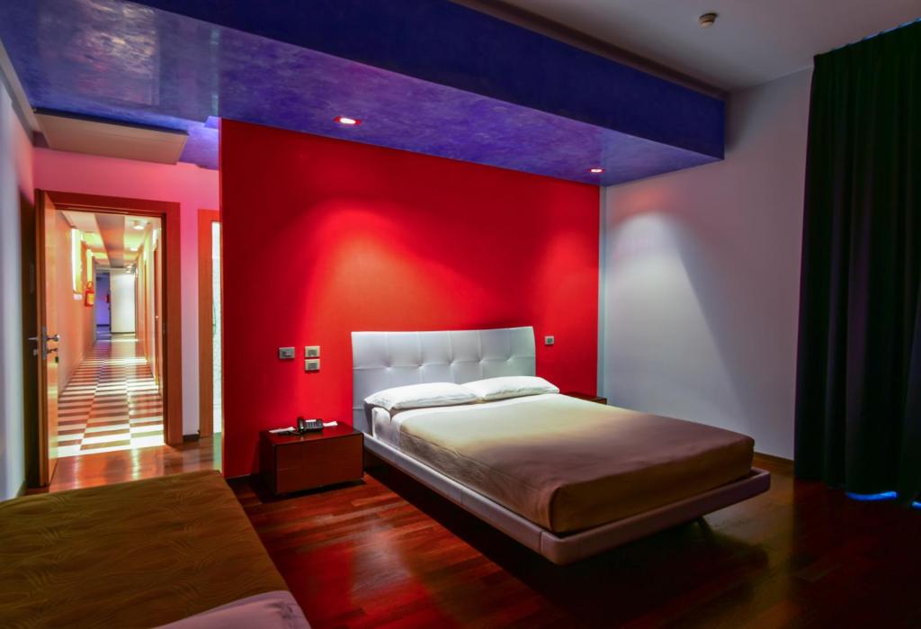 Postel nebo postele na pokoji v ubytování Arthotel & Park Lecce