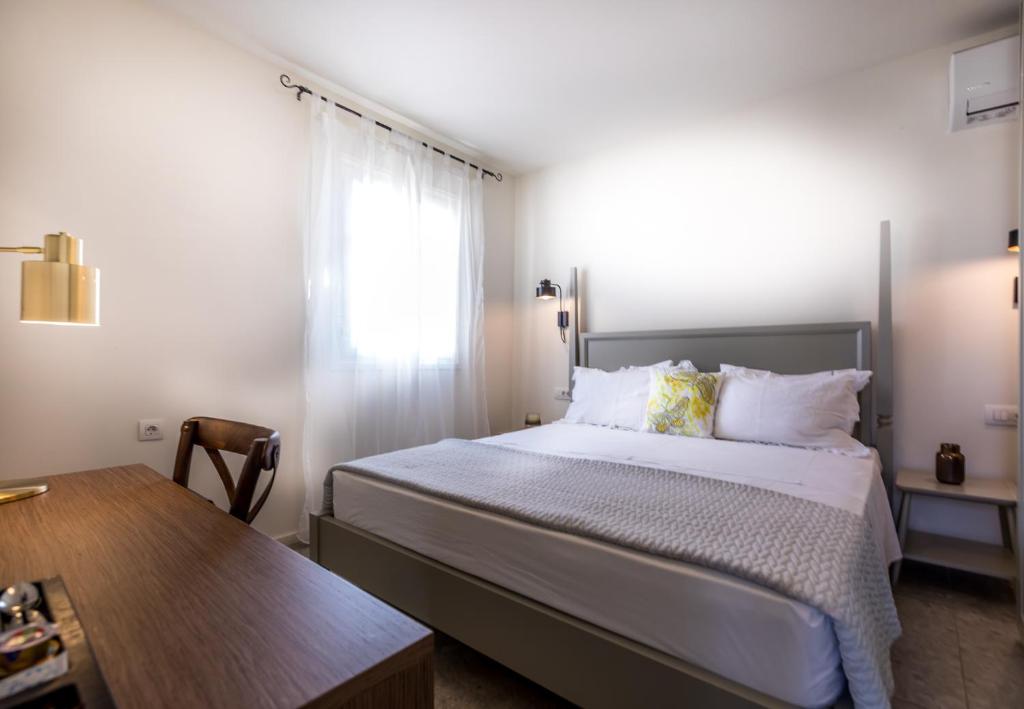 Postel nebo postele na pokoji v ubytování Lemon Tree House
