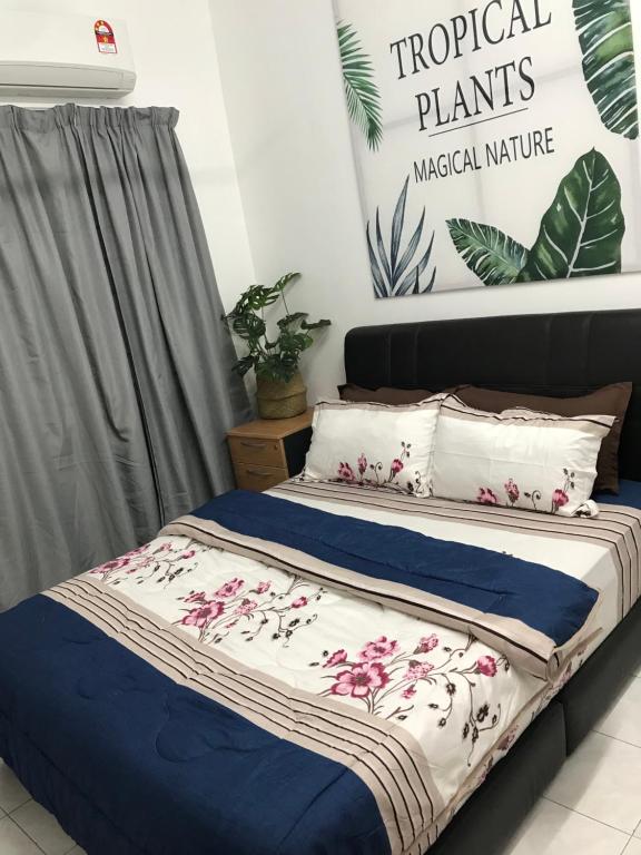 Postel nebo postele na pokoji v ubytování Botanic Gardens 26- 5-bedroom Near AEON Bukit Tinggi