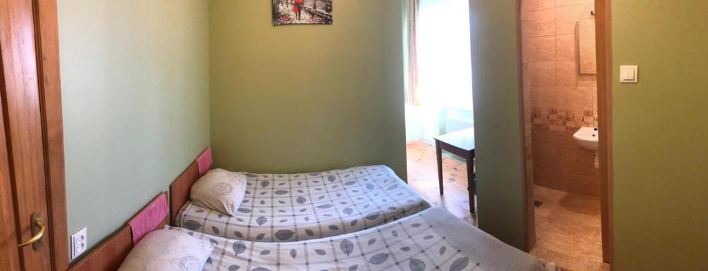 Postel nebo postele na pokoji v ubytování Coffee Hostel
