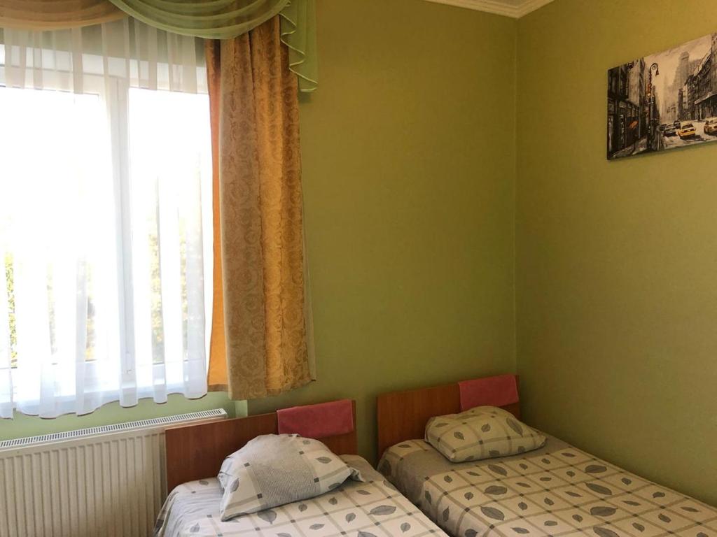 Postel nebo postele na pokoji v ubytování Coffee Hostel