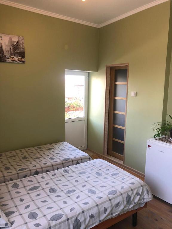 Postel nebo postele na pokoji v ubytování Coffee Hostel