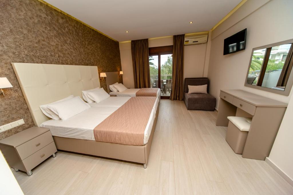 Posteľ alebo postele v izbe v ubytovaní Villa Diamantis Apartments