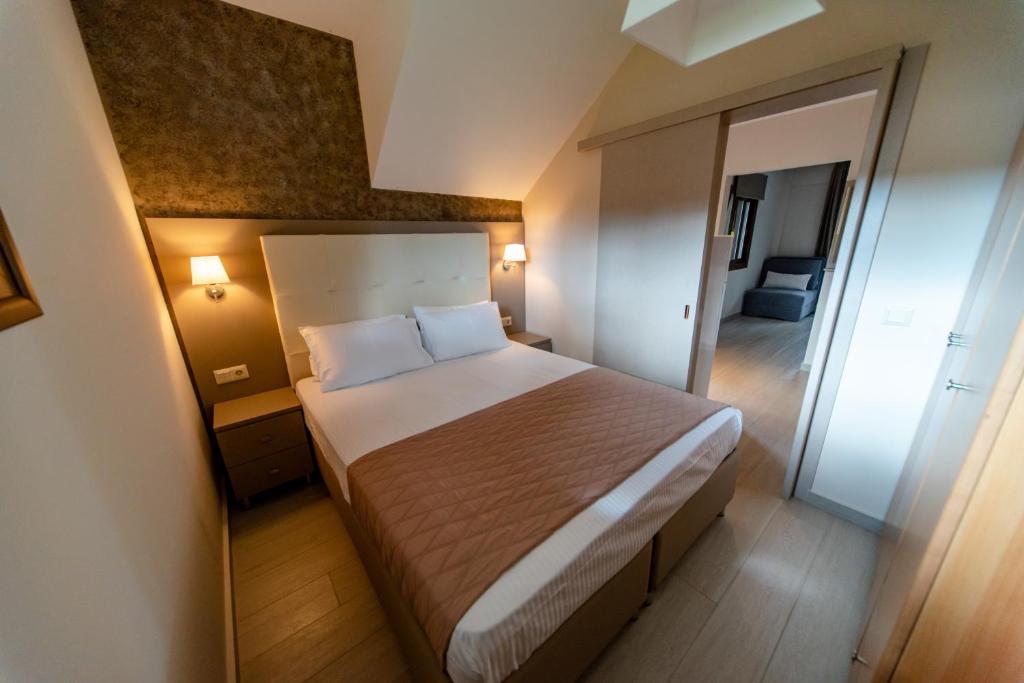 Posteľ alebo postele v izbe v ubytovaní Villa Diamantis Apartments