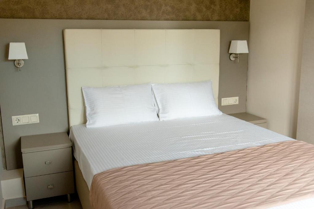 Posteľ alebo postele v izbe v ubytovaní Villa Diamantis Apartments