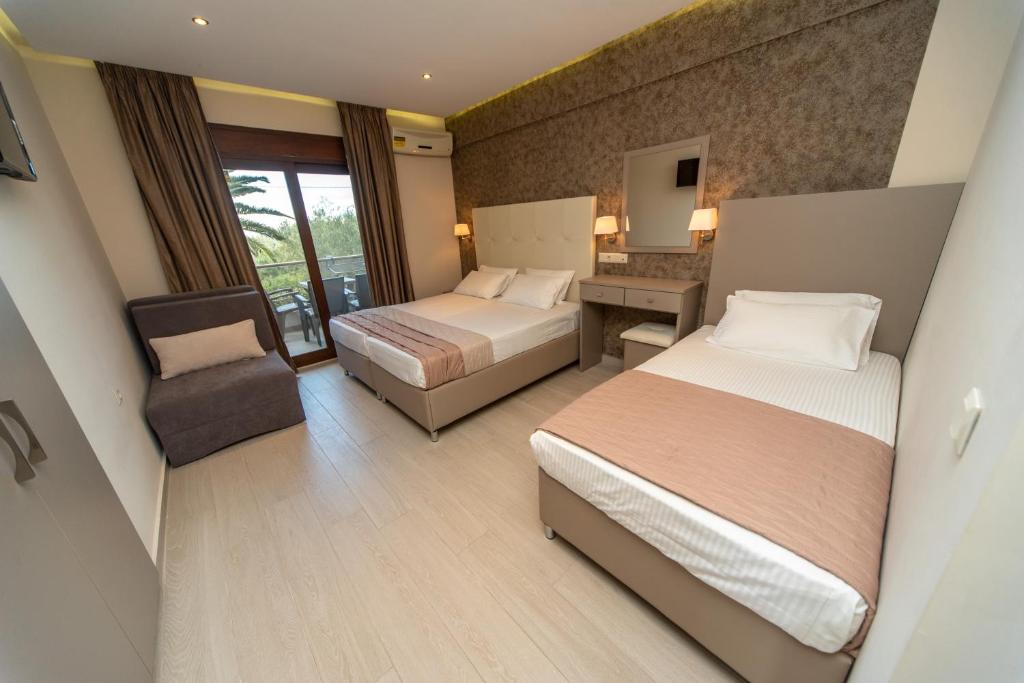 Posteľ alebo postele v izbe v ubytovaní Villa Diamantis Apartments