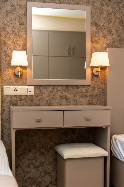 Posteľ alebo postele v izbe v ubytovaní Villa Diamantis Apartments