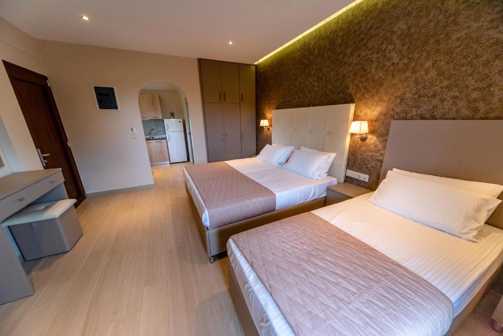 Posteľ alebo postele v izbe v ubytovaní Villa Diamantis Apartments