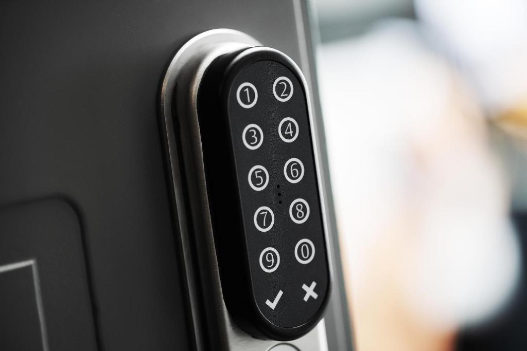 a close up of a remote control in a car at Hotel Filip in Oslo