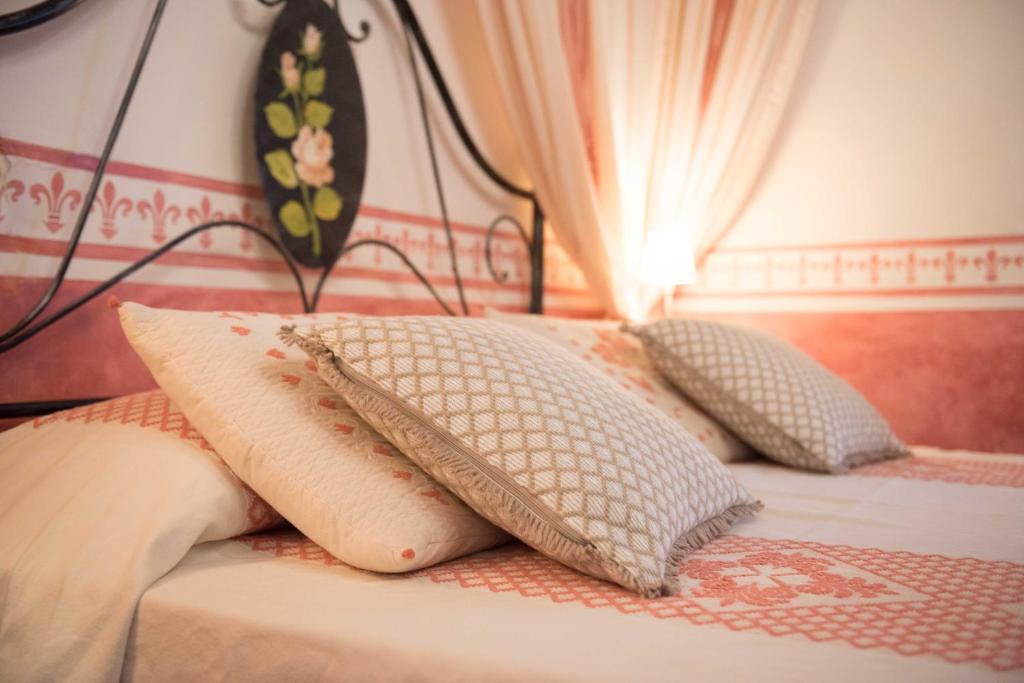 Postel nebo postele na pokoji v ubytování Hotel Anticos Palathos