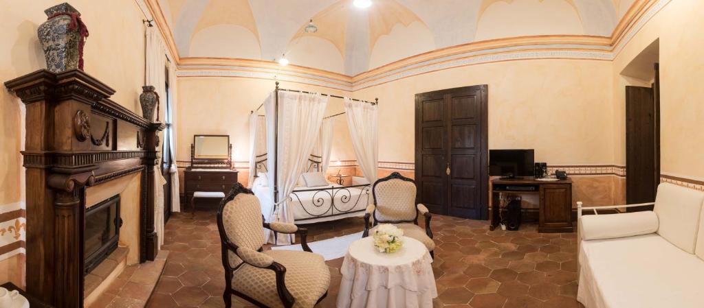 TV a/nebo společenská místnost v ubytování Hotel Anticos Palathos