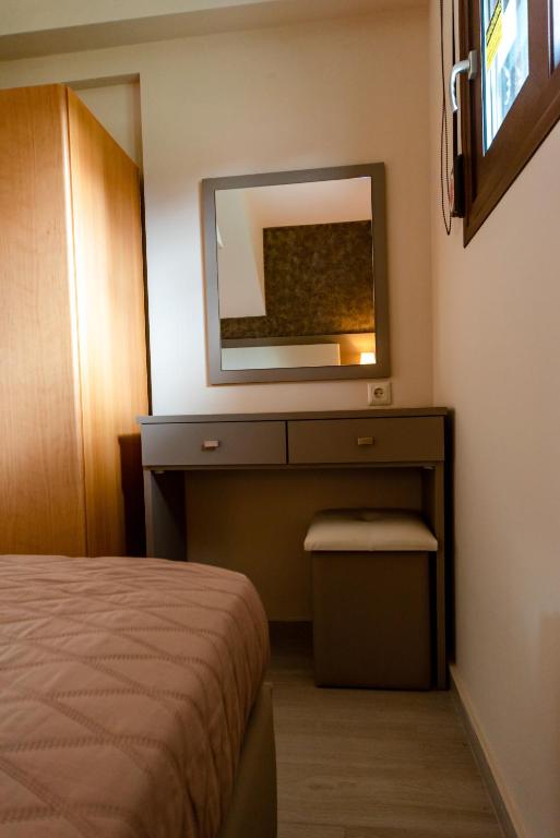 Posteľ alebo postele v izbe v ubytovaní Villa Diamantis Apartments