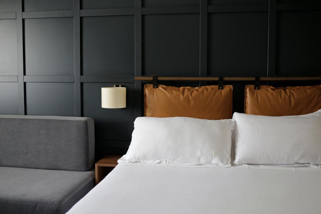 Letto o letti in una camera di c-hotels Club House Roma