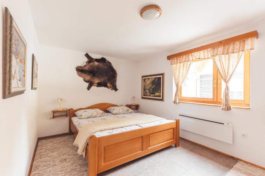 Postel nebo postele na pokoji v ubytování POHORJE HOUSE 2 FOUR APPARTMETNS