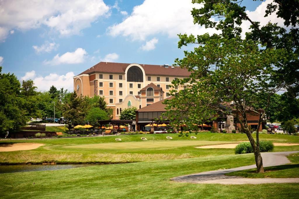 a building with a golf course with a green at Heritage Hills Golf Resort & Conference Center in York