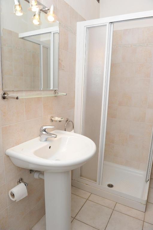 Koupelna v ubytování Hotel Isolabella