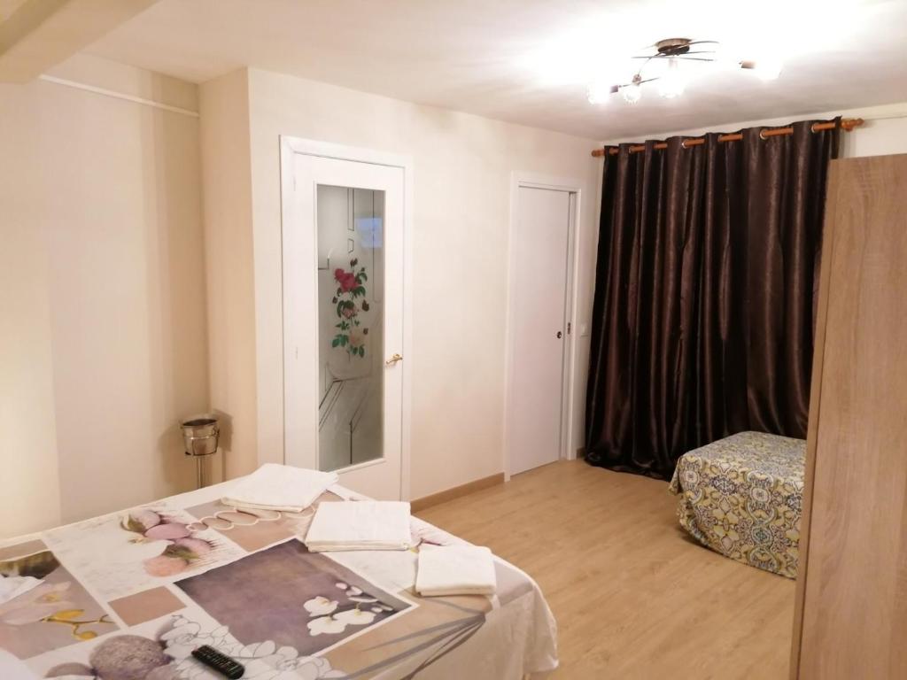 Postel nebo postele na pokoji v ubytování Hostel Penedes