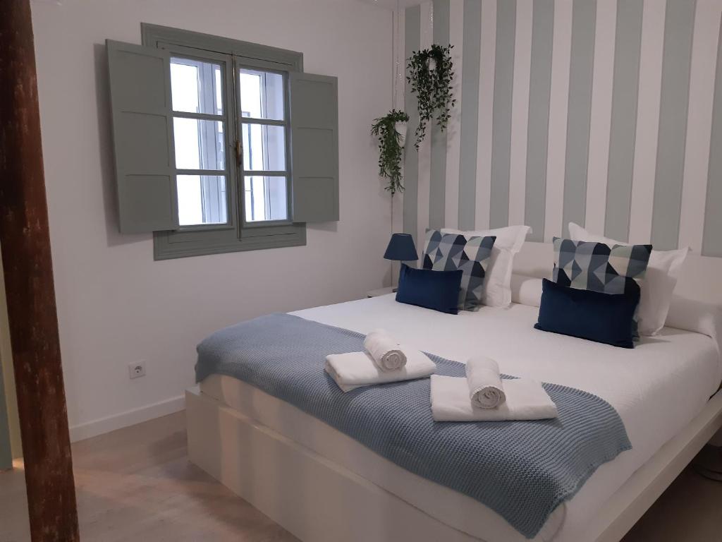 Postel nebo postele na pokoji v ubytování Malvaloca Quintero Plus