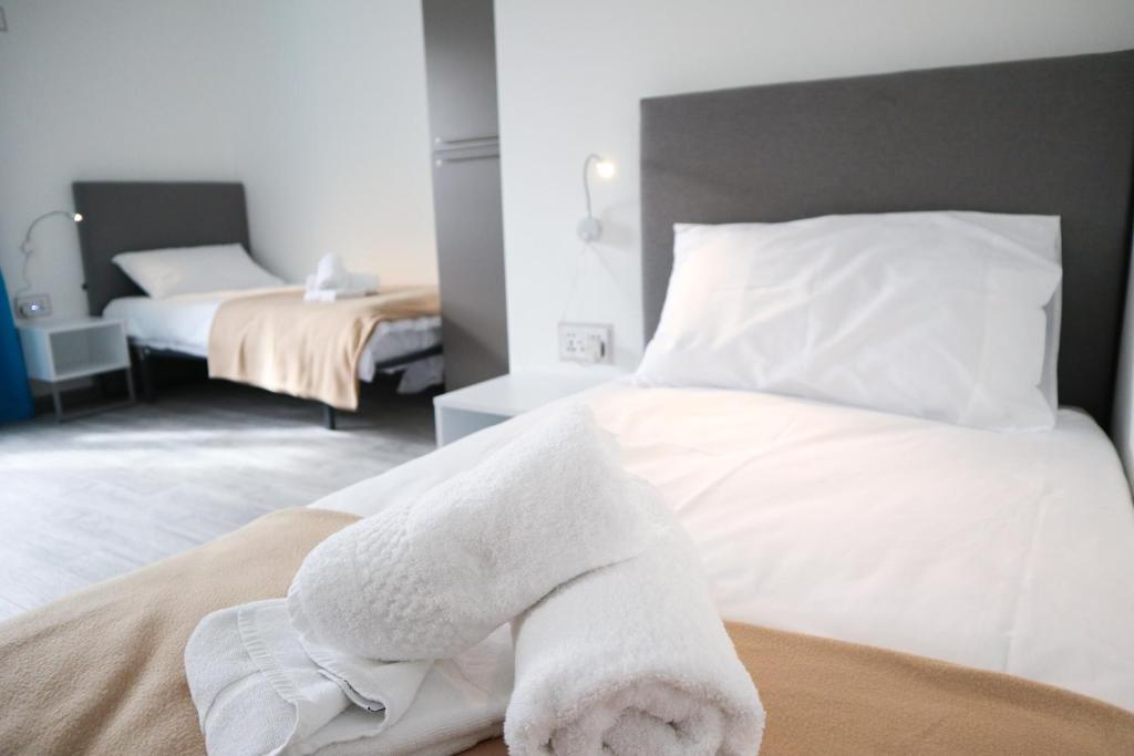 Postel nebo postele na pokoji v ubytování AM Hostel