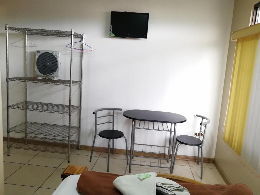 TV a/nebo společenská místnost v ubytování Hospedaje Yaldai