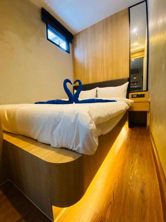 Postel nebo postele na pokoji v ubytování Patong Poshtel
