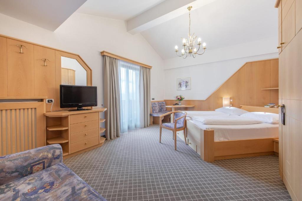 Postel nebo postele na pokoji v ubytování Hotel Hubertushof