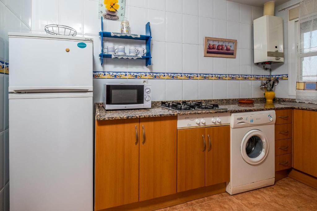 Kuchyň nebo kuchyňský kout v ubytování Apartamento las Torres