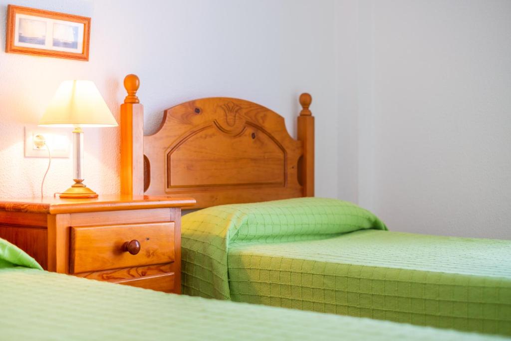 Postel nebo postele na pokoji v ubytování Apartamento las Torres