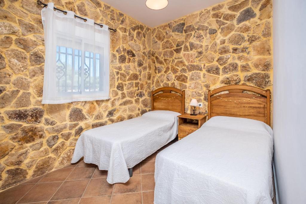 Posteľ alebo postele v izbe v ubytovaní Finca Encanto