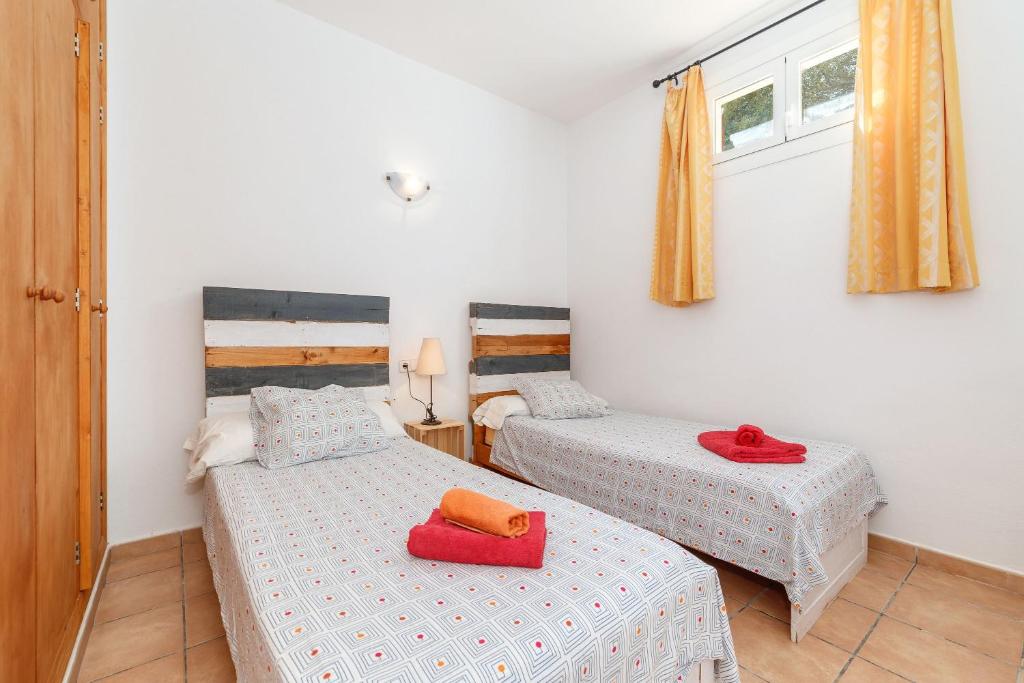 Postel nebo postele na pokoji v ubytování La Casita