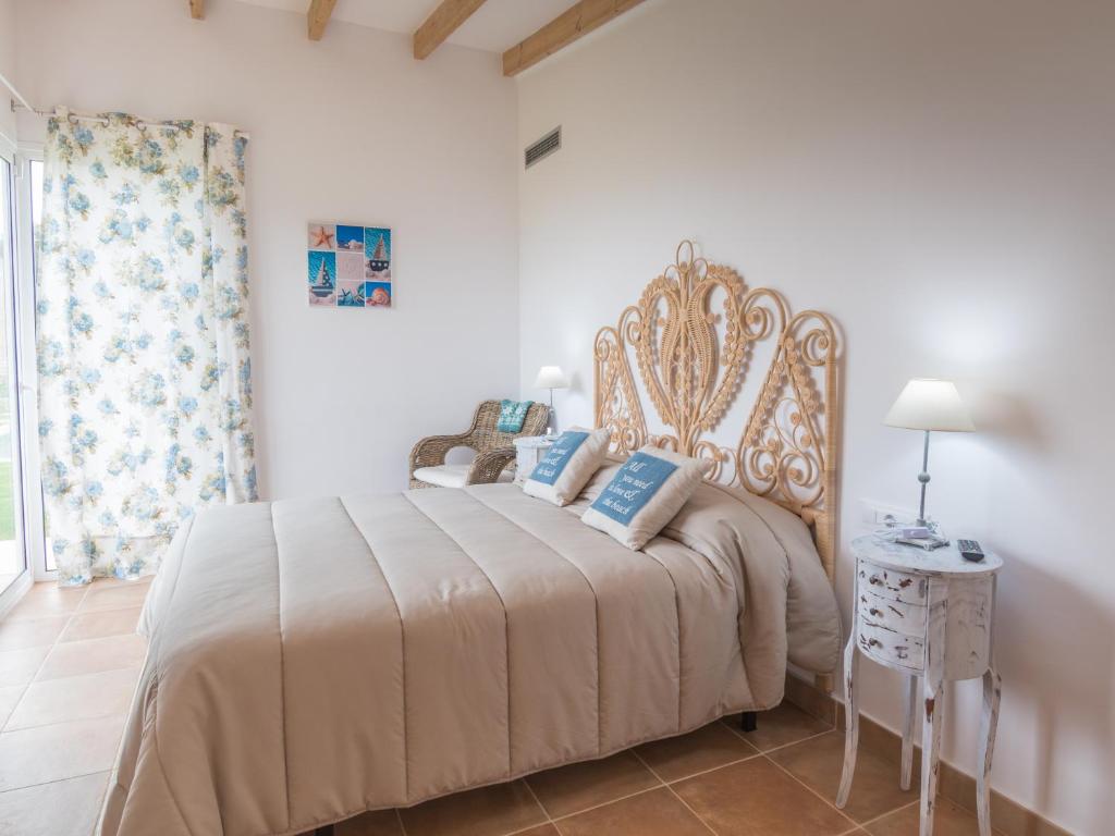 Postel nebo postele na pokoji v ubytování Villa De Lujo Frente A La Playa