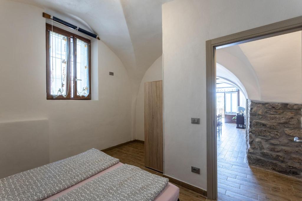 A bed or beds in a room at Lancillotto