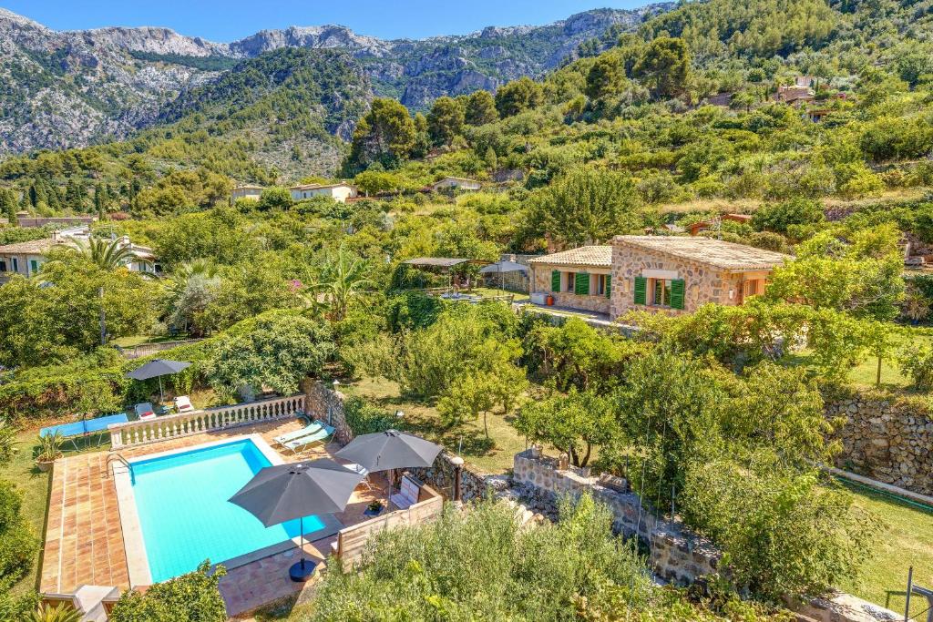 an aerial view of a house with a swimming pool at Sa Teulera Soller in Sóller