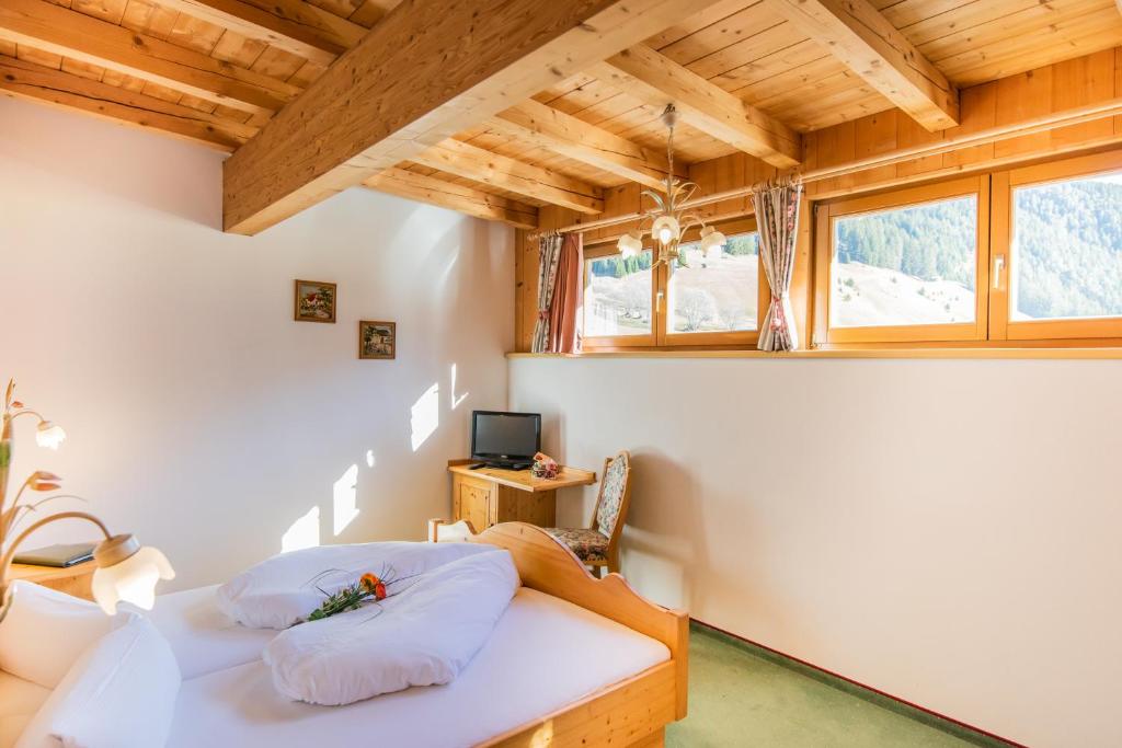 Postel nebo postele na pokoji v ubytování Panorama-Hotel Winklerhof