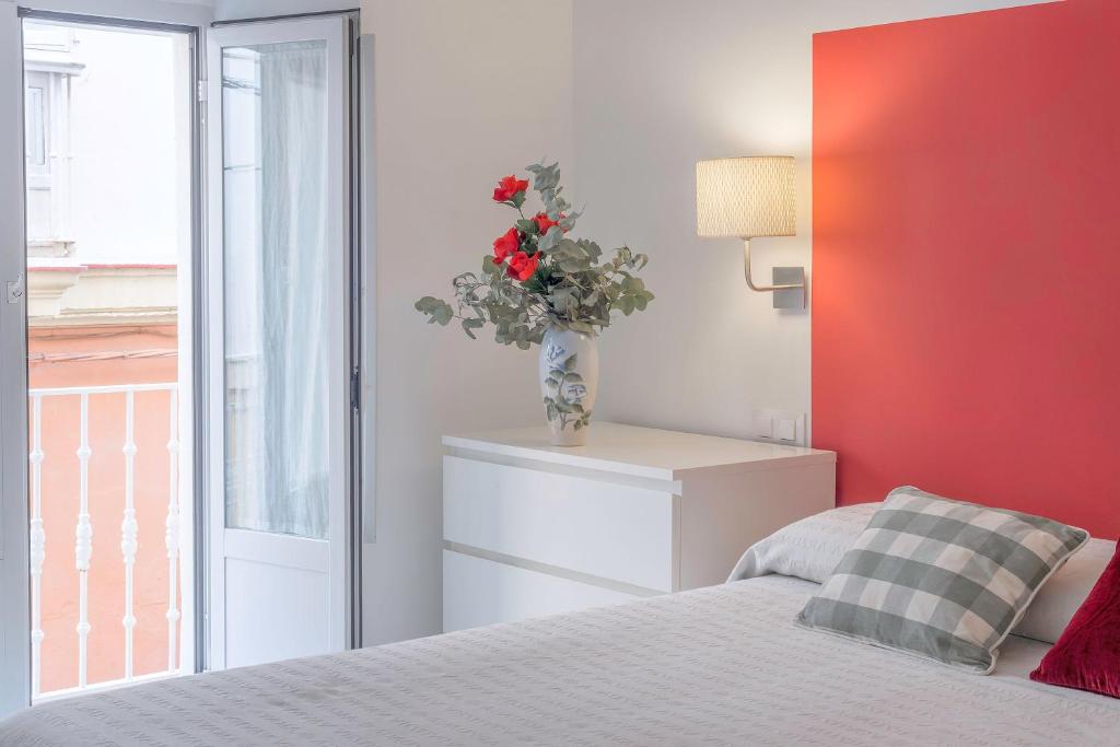 Posteľ alebo postele v izbe v ubytovaní Luminoso apartamento en el centro de Cádiz