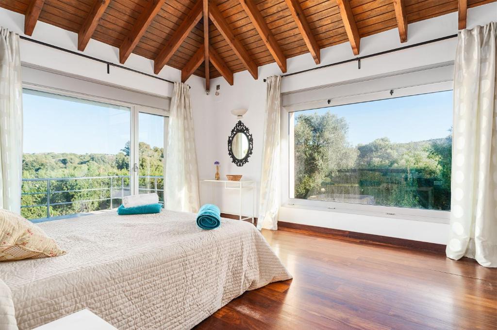 Postel nebo postele na pokoji v ubytování Finca Casa Rural Lumalú