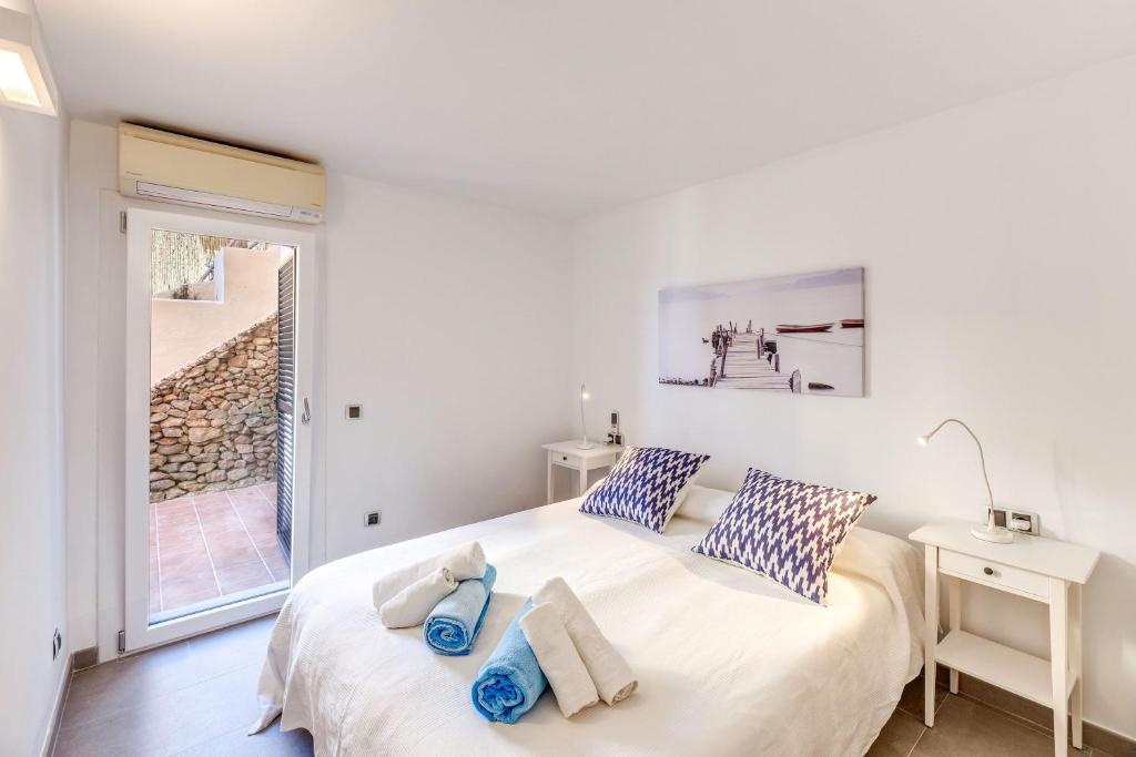 A bed or beds in a room at Apartamento Mirador