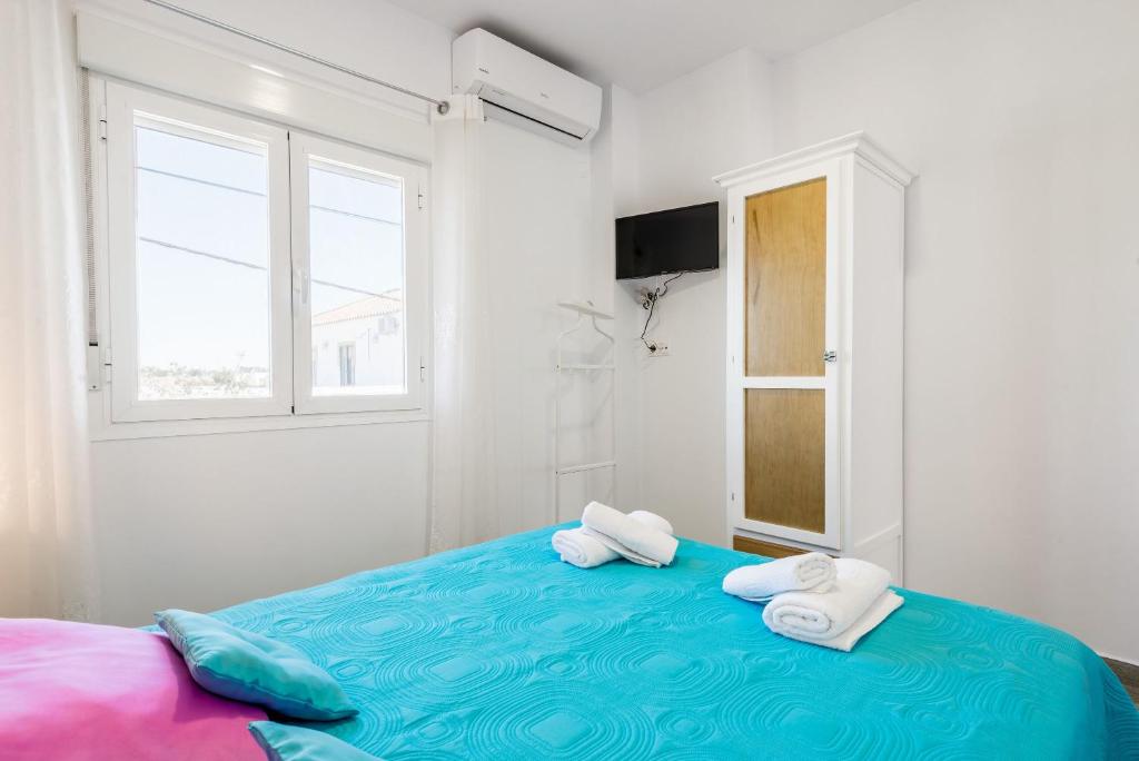 Postel nebo postele na pokoji v ubytování Apartamento La Higuera 2