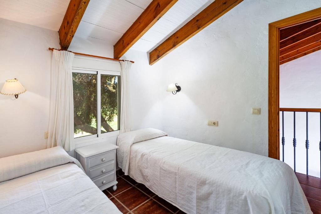 Postel nebo postele na pokoji v ubytování Casa Isabel 3