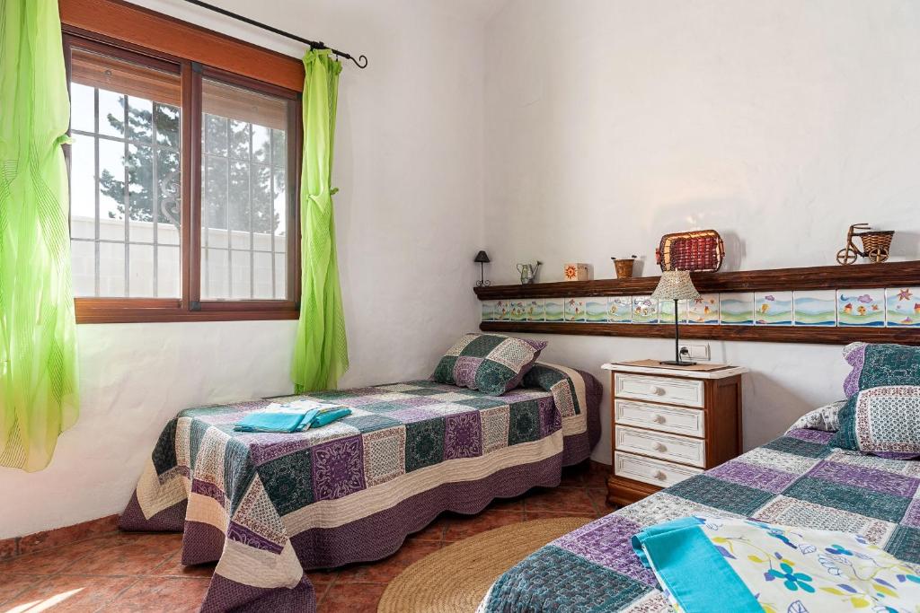 Posteľ alebo postele v izbe v ubytovaní Casa Estefanía