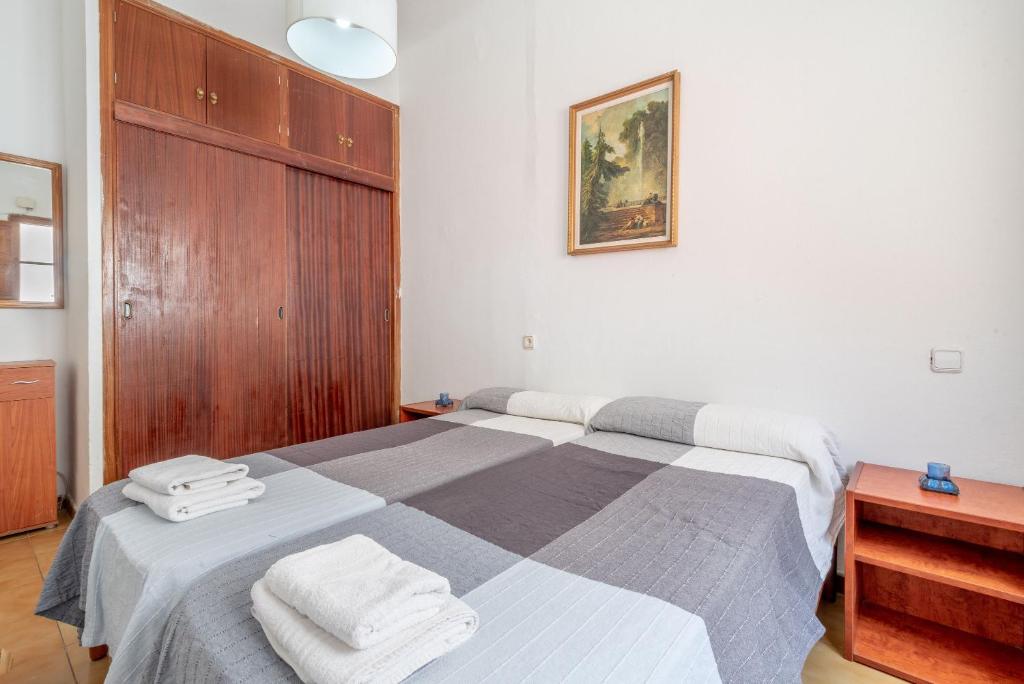 Postel nebo postele na pokoji v ubytování Nafeti