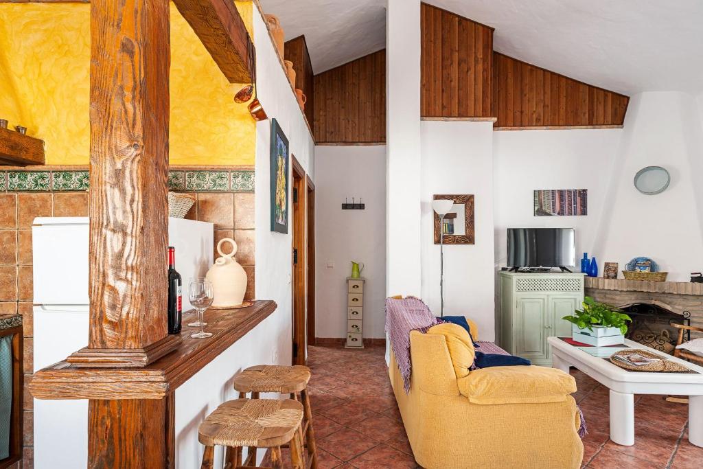 Televízia a/alebo spoločenská miestnosť v ubytovaní Casa Estefanía