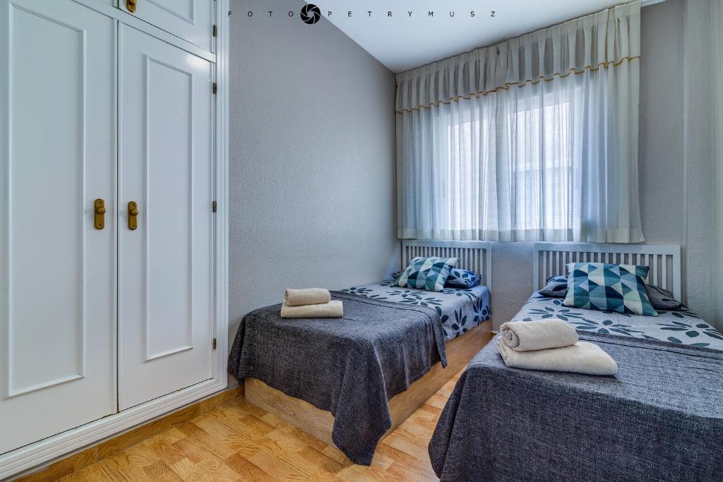 Posteľ alebo postele v izbe v ubytovaní 108 Apartament Fabulus