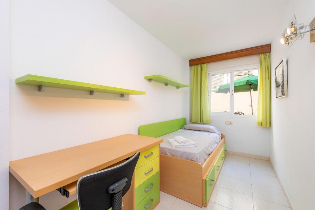 A bed or beds in a room at Marbi
